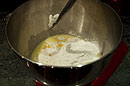 d the melted butter, 1 teaspoon lemon juice, cake flour, and enough of the bread flour to make a soft, smooth dough