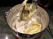Adding the flour mixture in thirds