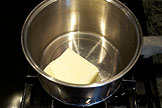 Melt butter in a large heavey bottomed saucepan
