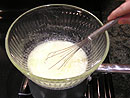 egg whites and sugar in a mixing bowl