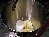 Combine the sugar, butter, egg, and vanilla in a mixing bowl