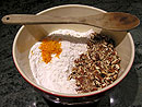  Stir in orange zest and pecans to the flour mixture
