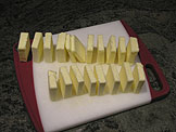Cut the butter into two inch pieces,