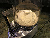 Process the flour, salt, and sugar in a food processor until combined
