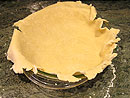 Transfer the dough to a 9-inch pie tin