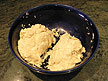 Divide the dough into 2 balls and flatten each into a 4-inch disk