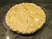 Brush the top of the crust with the beaten egg and sprinkle evenly with the remaining 1 tablespoon of sugar.