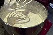 Whip the heavy cream, 4 teaspoons (20 g) sugar, and vanilla until stiff peaks form