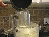 add in the simple syrup with the food processor running