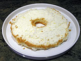Slice into thirds and set the bottom third on the tray you will use to present the cake